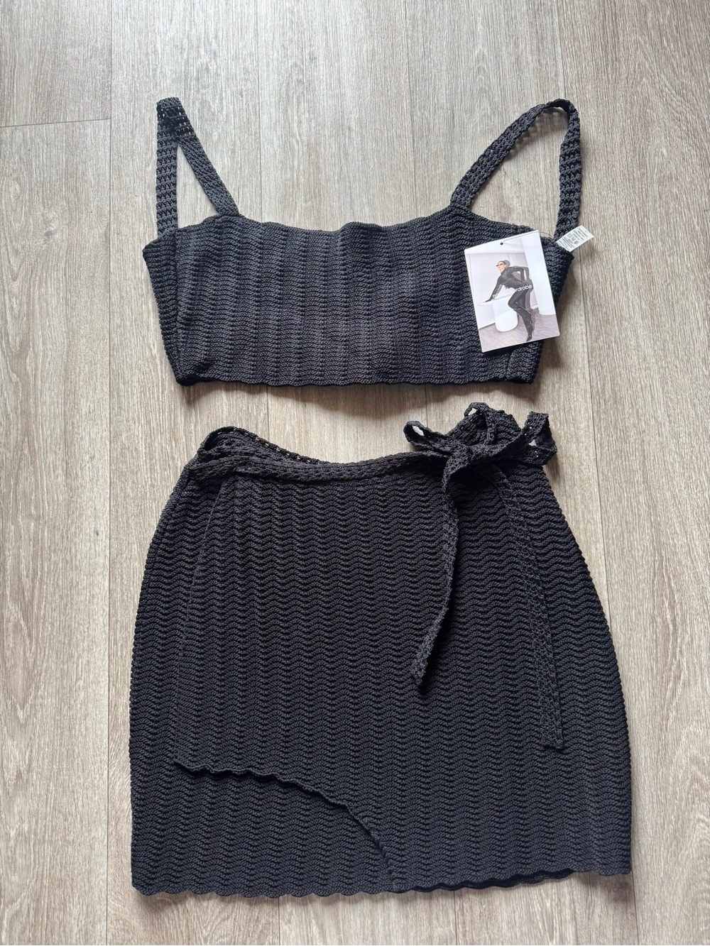 The Naked Wardrobe Black Crochet Two-Piece Crop Top + Wrap Skirt Sets